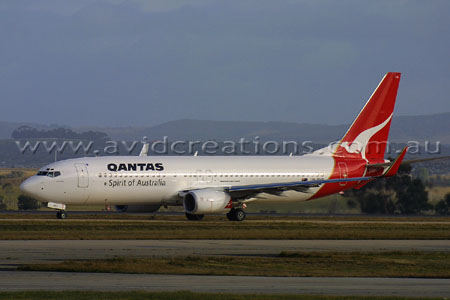 VH-VXD taxiing for departure.